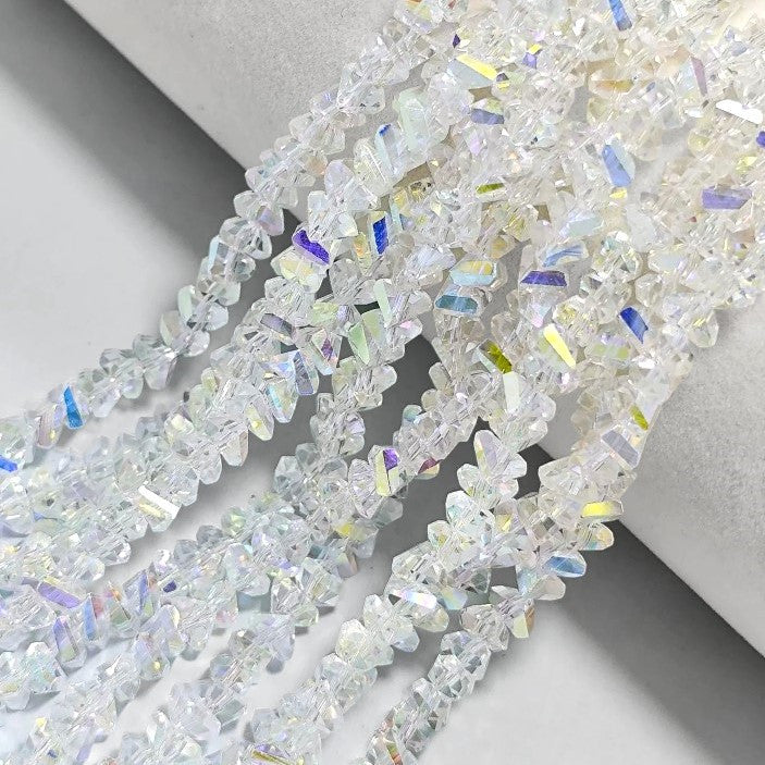 Намистини Swarovski огранювання трикутник 3 мм 27 см (+-130 шт.) Прозорий АВ+